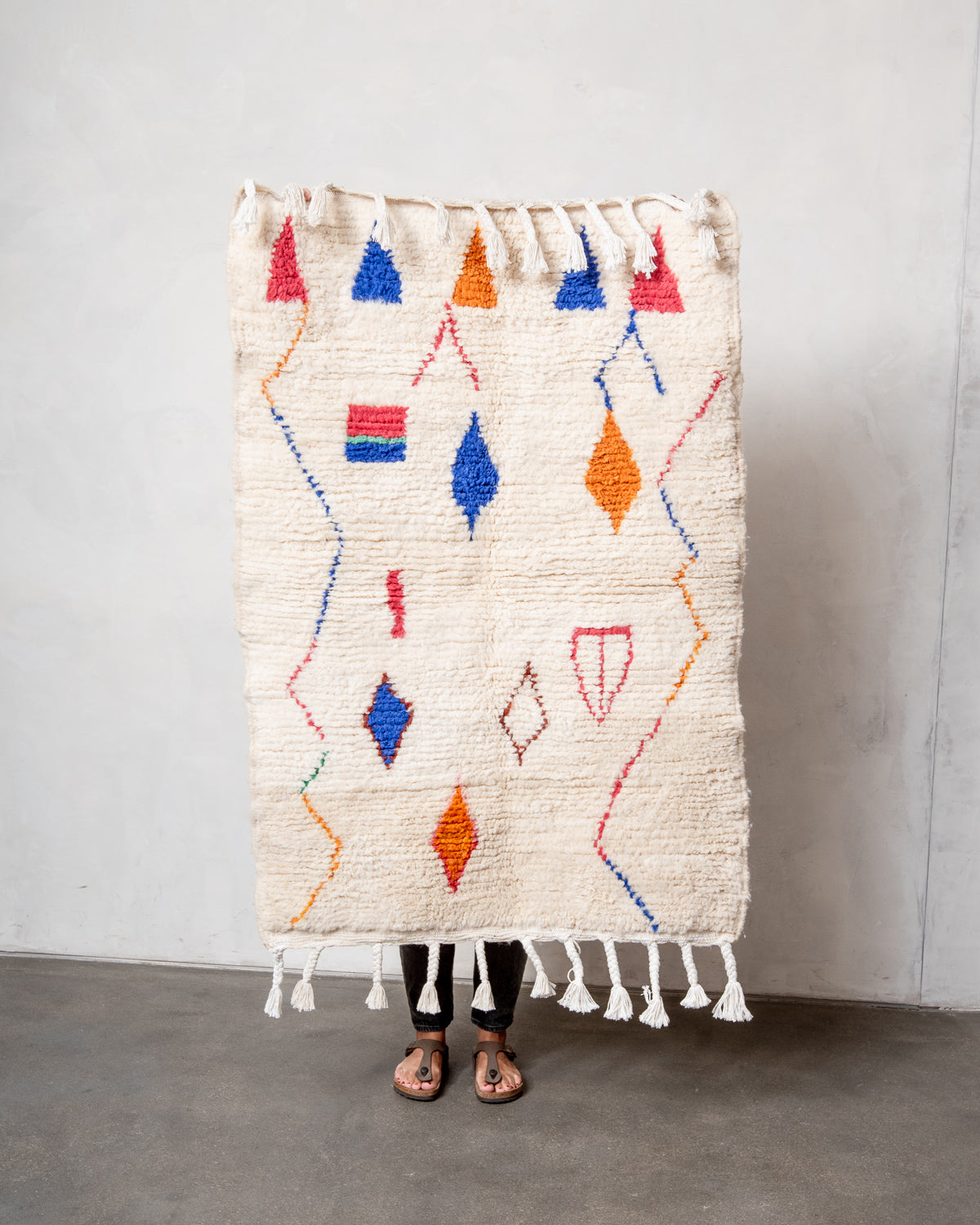 Modern, designer, handcrafted Berber rug from Morocco. Beniourain carpet with beautiful colours and patterns and fluffy wool texture.